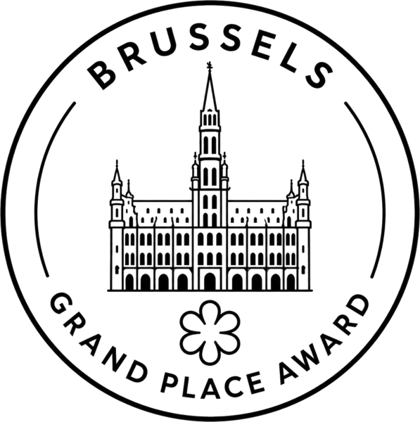 The Grand-Place Award seal: a line drawing of the Brussels Town Hall inside a ring lettered Brussels Grand Place Award