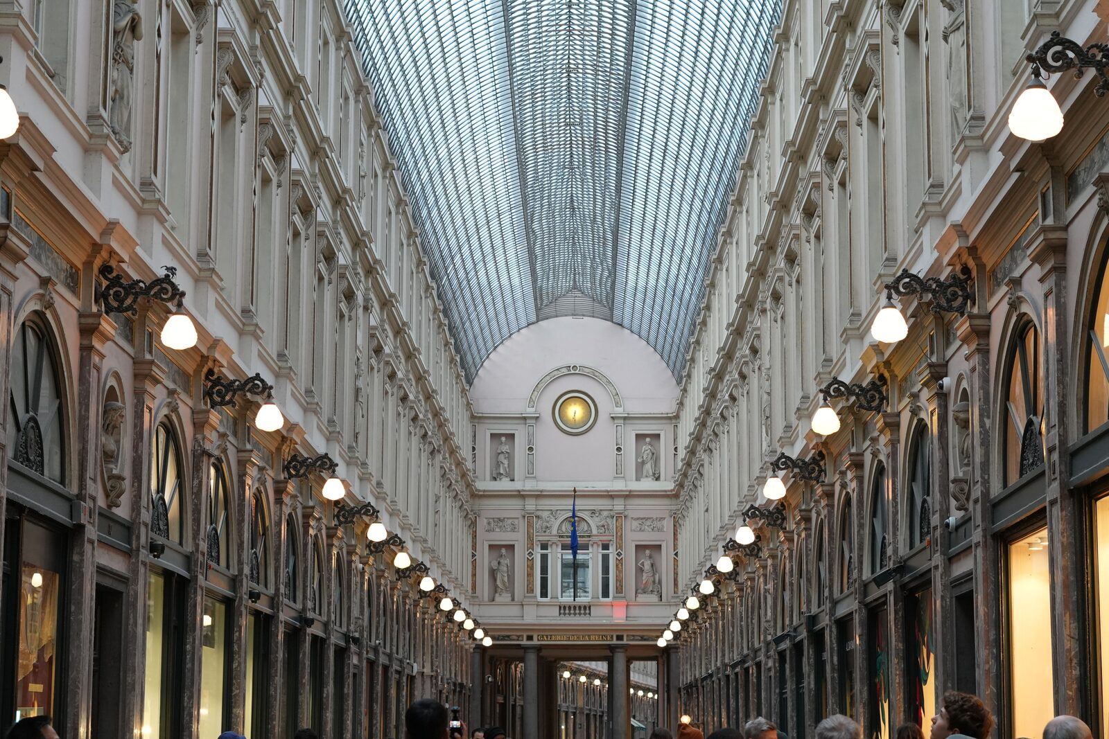The glazed barrel-vaulted roof and lamp-lit arcade of the Galeries Royales Saint-Hubert in Brussels