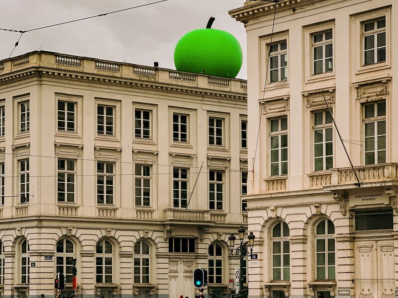 The Magritte Museum on the Place Royale in Brussels, with the giant green apple installed on its roof