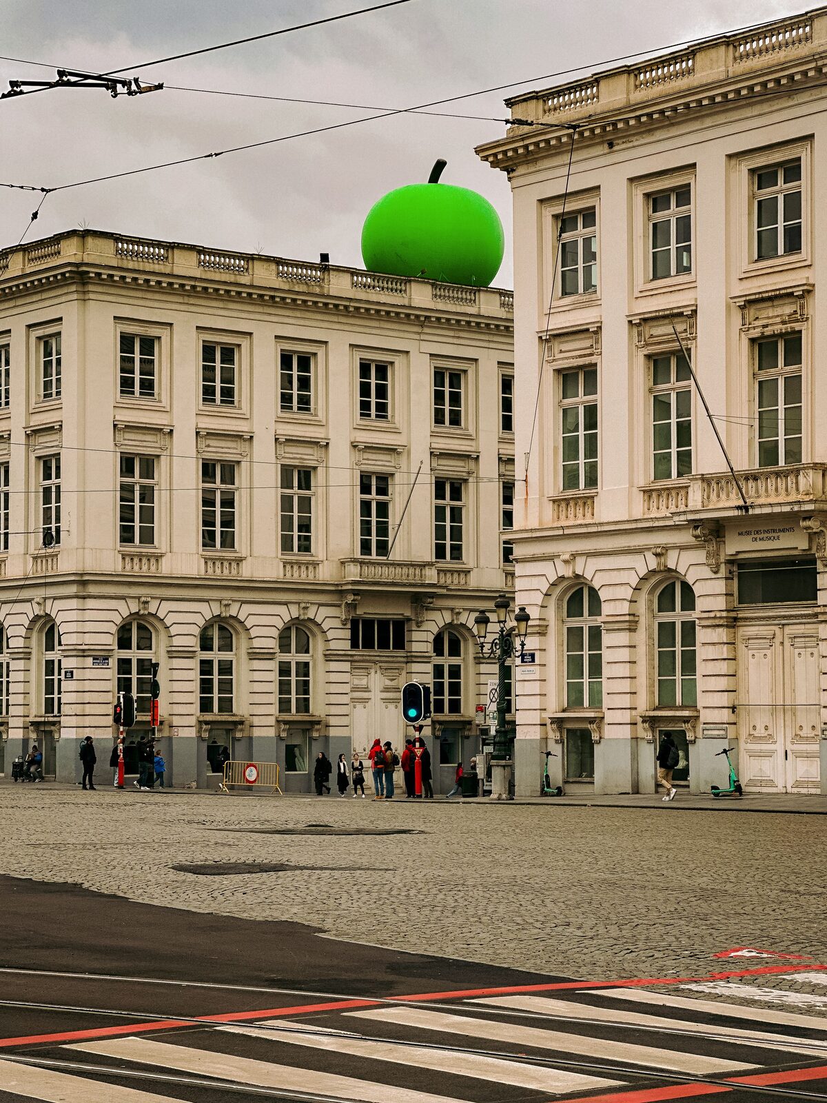 The Magritte Museum on the Place Royale in Brussels, with the giant green apple installed on its roof